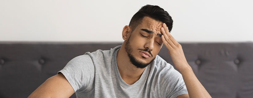 patient needing headache chiropractor in Allen TX